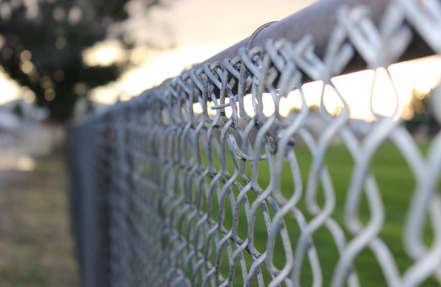 Galvanised chain-link fence