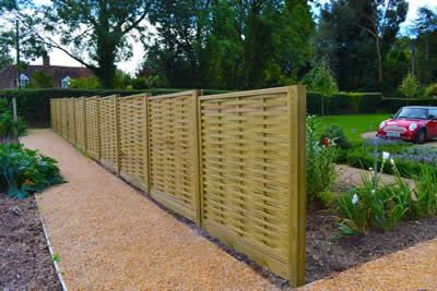 Fence panels with wooden posts