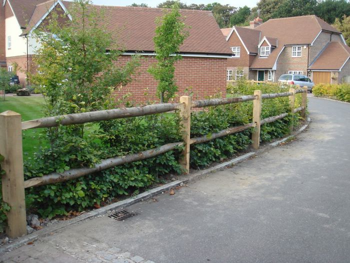 Cleft chestnut post & rail fencing with oak posts