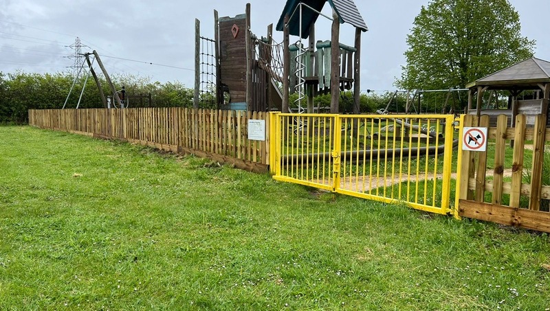 Yellow gate at Little Milton Playground